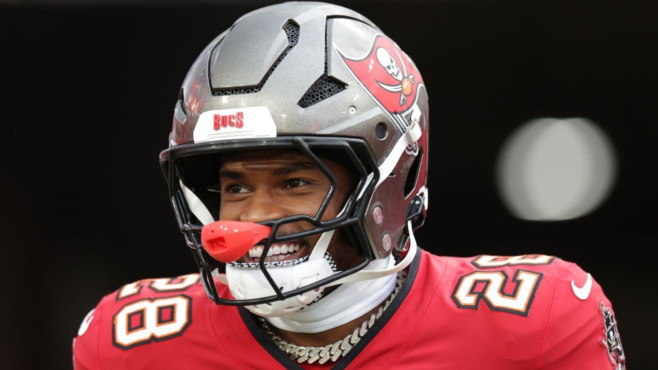 Tampa Bay Buccaneers safety Shilo Sanders (28) takes the field for warmups before a preseason game against the Tennessee Titans at Raymond James Stadium.