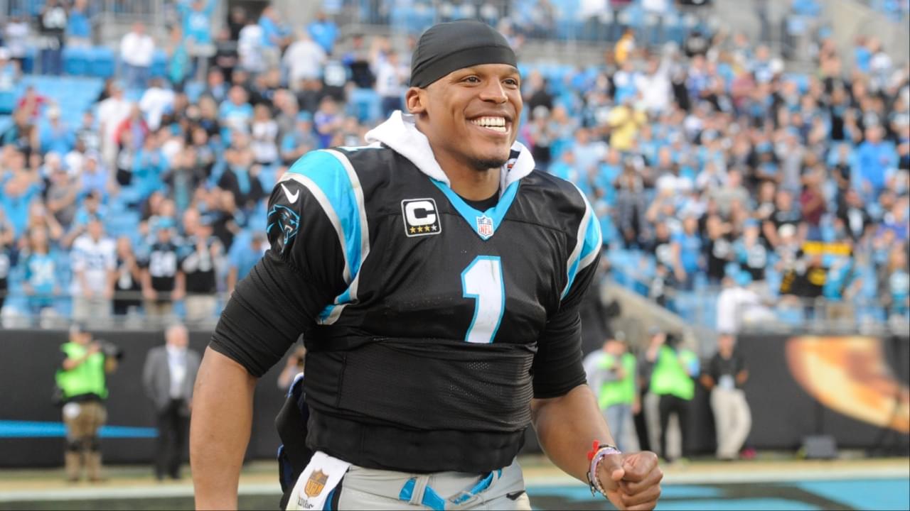 Carolina Panthers quarterback Cam Newton (1) celebrates as his team goes 13-0 against the Atlanta Falcons at Bank of America Stadium. Panthers win 38-0.