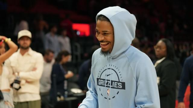 Oct 17, 2025; Miami, Florida, USA; Memphis Grizzlies guard Ja Morant (12) who did not play due to injury, leaves the court after the Memphis Grizzlies defeat the Miami Heat at Kaseya Center. Mandatory Credit: Jim Rassol-Imagn Images
