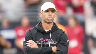Arizona Cardinals head coach Jonathan Gannon stands on the field before their game against the Tennessee Titans at State Farm Stadium.