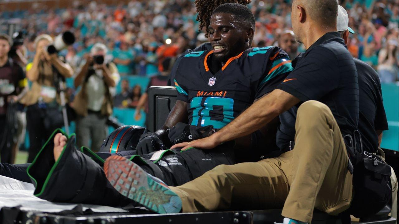 Miami Dolphins wide receiver Tyreek Hill (10) reacts after being placed on a medical cart against the New York Jets during the second half at Hard Rock Stadium.