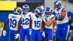 Los Angeles Rams wide receiver Konata Mumpfield (15) celebrates a touchdown with linebacker Byron Young (0), running back Blake Corum (22), and wide receiver Xavier Smith (19) against the Los Angeles Chargers during the first quarter at SoFi Stadium.