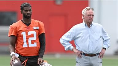 Cleveland Browns quarterback Shedeur Sanders (12) and managing and principal partner Jimmy Haslam watch a play during minicamp at CrossCountry Mortgage Campus.