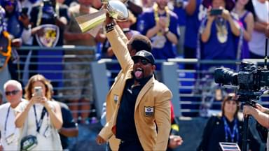 Baltimore Ravens former player Ray Lewis holds up the Lombardi trophy before the game between the Baltimore Ravens and the Cleveland Browns at M&T Bank Stadium.
