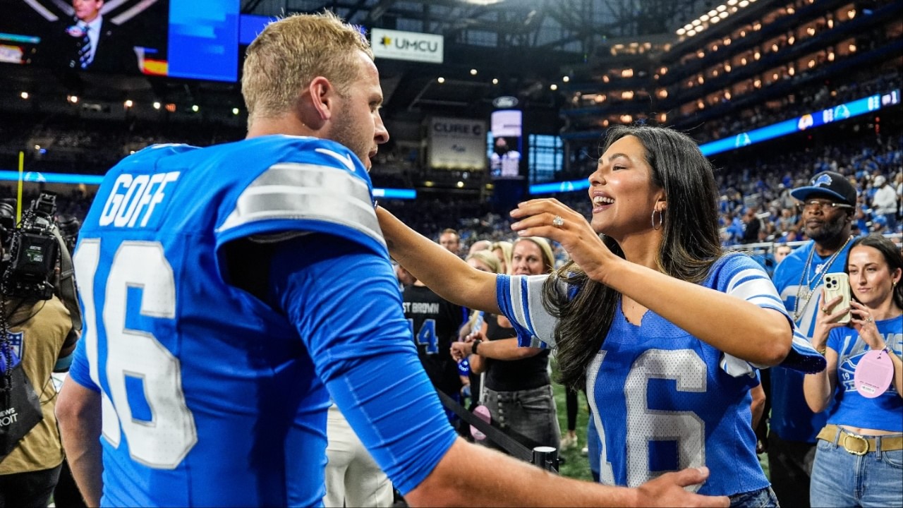 Detroit Lions quarterback Jared Goff hugs his wife Christen Harper during warmups before the Los Angeles Rams game at Ford Field in Detroit on Sunday, Sept. 8, 2024. Detroit Lions quarterback Jared Goff hugs his wife Christen Harper during warmups before the Los Angeles Rams game at Ford Field in Detroit on Sunday, Sept. 8, 2024. Credit - USA TODAY Sports