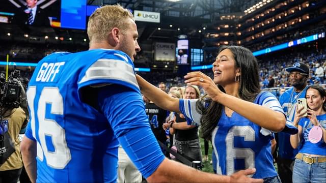Detroit Lions quarterback Jared Goff hugs his wife Christen Harper during warmups before the Los Angeles Rams game at Ford Field in Detroit on Sunday, Sept. 8, 2024.