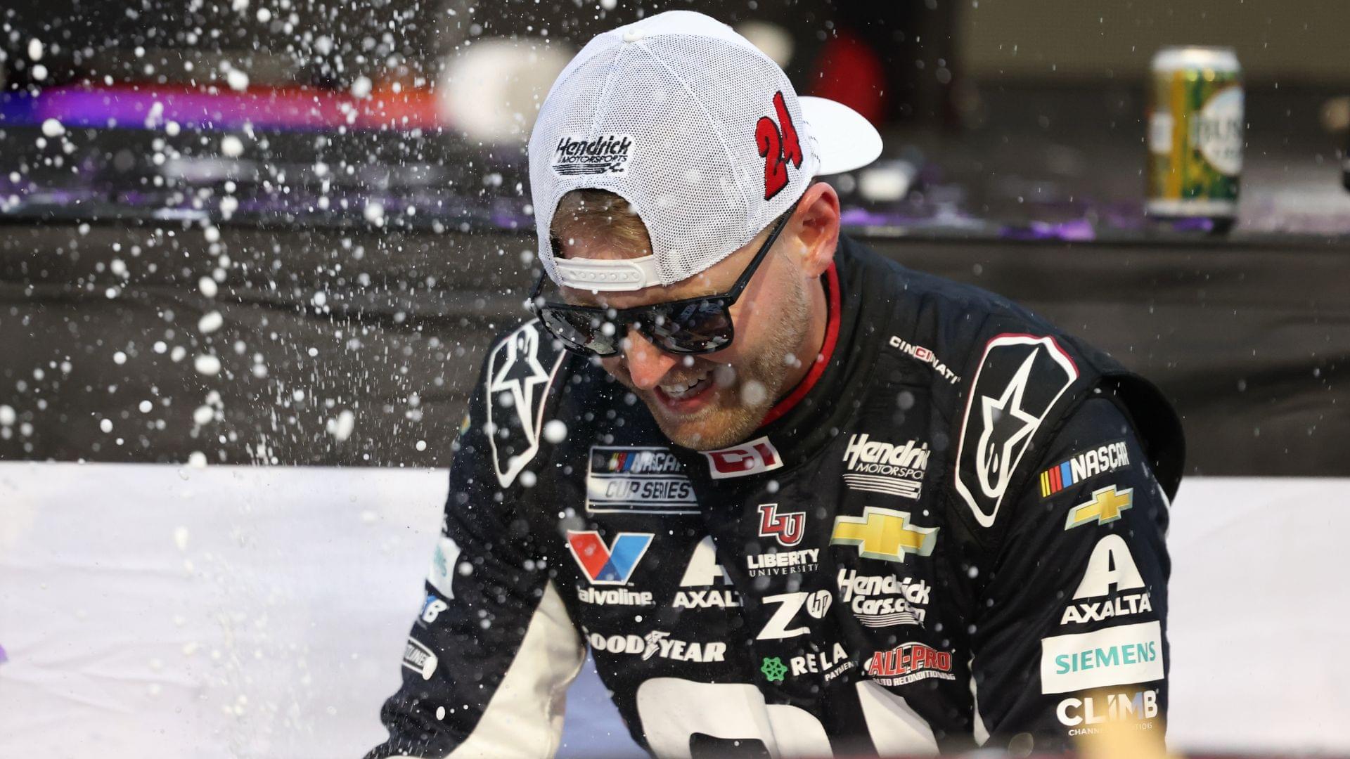 Oct 26, 2025; Martinsville, Virginia, USA; NASCAR Cup Series driver William Byron (24) celebrates his win following the Xfinity 500 at Martinsville Speedway