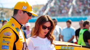 Nov 10, 2019; Avondale, AZ, USA; NASCAR Cup Series driver Kyle Busch (left) and wife Samantha Busch during the Bluegreen Vacations 500 at ISM Raceway