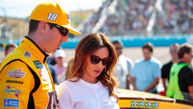 Nov 10, 2019; Avondale, AZ, USA; NASCAR Cup Series driver Kyle Busch (left) and wife Samantha Busch during the Bluegreen Vacations 500 at ISM Raceway