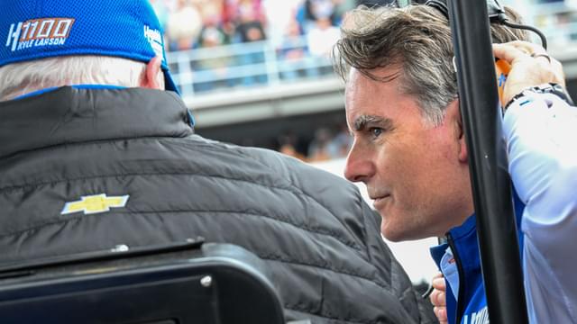 Jeff Gordon, right, chats with Rick Hendrick, left, the owner of Hendrick Motorsports, Sunday, May 25, 2025
