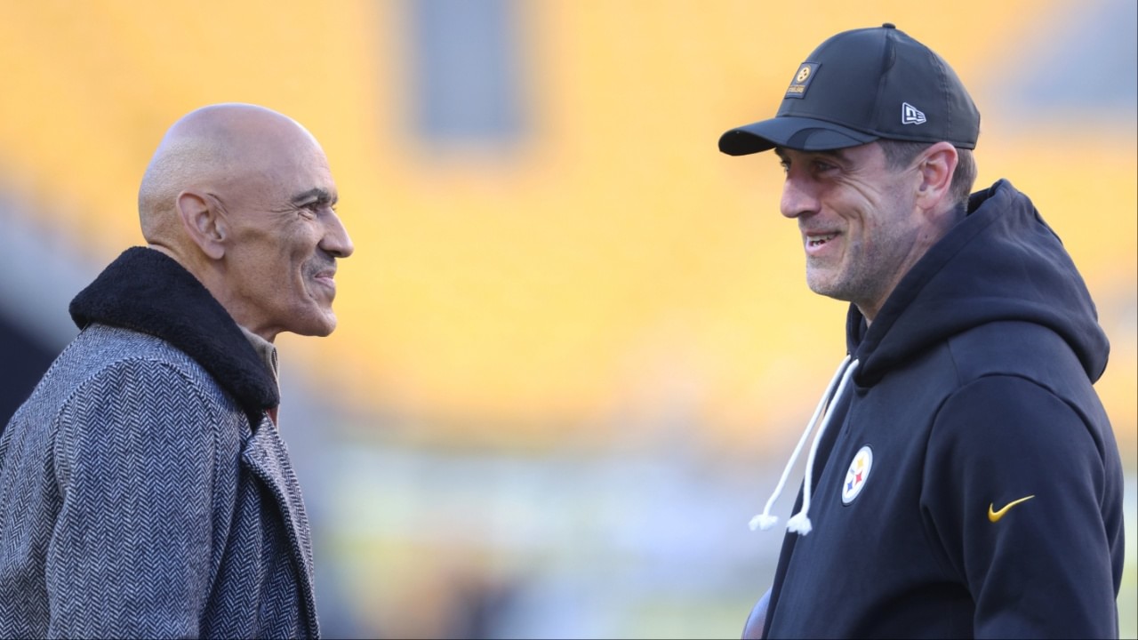 Professional Football Hall of Fame coach Tony Dungy (left) talks with Pittsburgh Steelers quarterback Aaron Rodgers (right) before the Steelers host the Green Bay Packers at Acrisure Stadium. Oct 26, 2025; Pittsburgh, Pennsylvania, USA; Professional Football Hall of Fame coach Tony Dungy (left) talks with Pittsburgh Steelers quarterback Aaron Rodgers (right) before the Steelers host the Green Bay Packers at Acrisure Stadium. Mandatory Credit: Charles LeClaire-Imagn Images
