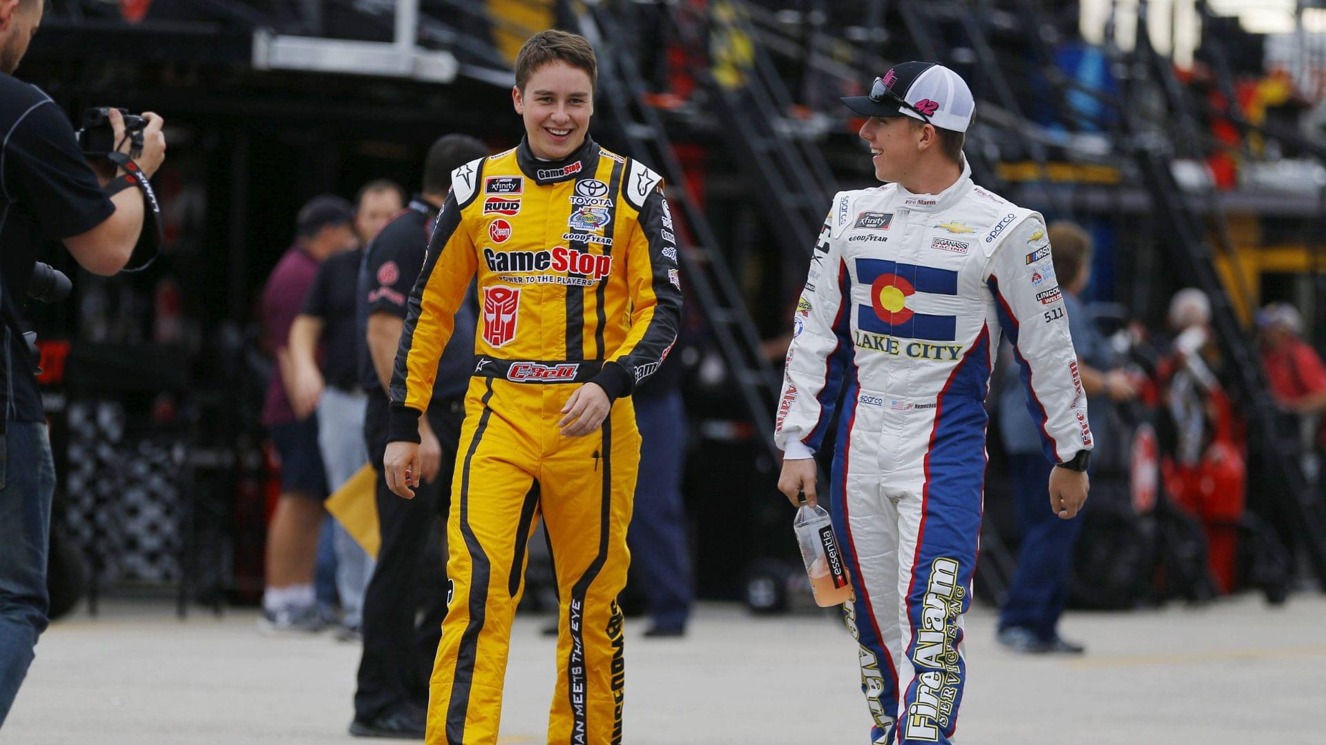 November 16, 2018 - Homestead, Florida, U.S. - Christopher Bell (20) and Kyle Larson (42) hang out in the garage during practice for the Ford 300 at Homestead-Miami Speedway in Homestead, Florida