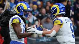 Los Angeles Rams wide receiver Davante Adams (17) celebrates with quarterback Matthew Stafford (9) after scoring a touchdown against the Jacksonville Jaguars during the first half during a NFL International Series game at Wembley Stadium.