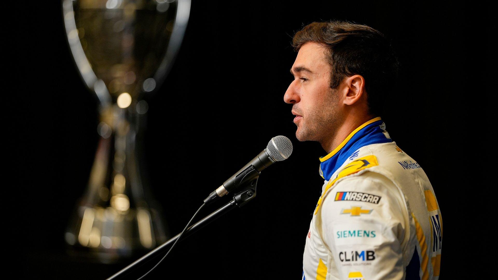 Aug 27, 2025; Charlotte, NC, USA; Chase Elliott answers questions from the media during NASCAR Cup Series Playoff Media Day at Charlotte Convention Center