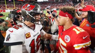Tampa Bay Buccaneers quarterback Tom Brady (12) greets Kansas City Chiefs quarterback Patrick Mahomes (15) after a game at Raymond James Stadium.
