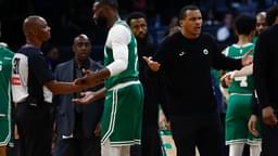 Oct 22, 2025; Boston, Massachusetts, USA; As Boston Celtics guard Jaylen Brown (7) talks with referee Michael Smith (38), head coach Joe Mazzulla gestures towards another official after Brown was called for a charge during the second half against the Philadelphia 76ers at TD Garden