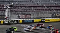 Sep 27, 2020; Las Vegas, Nevada, USA; NASCAR Cup Series driver Kurt Busch (1) leads driver Matt DiBenedetto (21) and driver Denny Hamlin (11) to win the South Point 400 at Las Vegas Motor Speedway