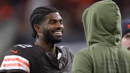 Cleveland Browns quarterback Shedeur Sanders (12) is all smiles as he chats on the sideline during the second half of an NFL football game at Huntington Bank Field, Nov. 16, 2025, in Cleveland, Ohio.