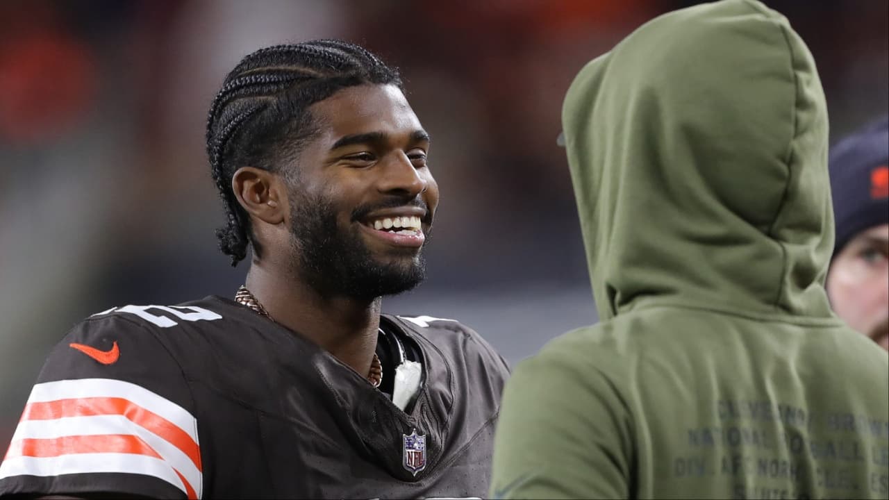 Cleveland Browns quarterback Shedeur Sanders (12) is all smiles as he chats on the sideline during the second half of an NFL football game at Huntington Bank Field, Nov. 16, 2025, in Cleveland, Ohio.