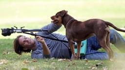 NFL proTom Brady shows a more sensitive side as he shoots scenes for an UGG boots commercial with his real-life dog Lua 62758, LOS ANGELES, CALIFORNIA - Wednesday June 15, 2011.