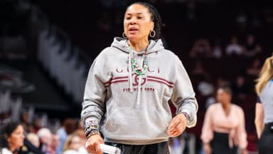 Nov 23, 2025; Columbia, South Carolina, USA; South Carolina Gamecocks head coach Dawn Staley directs her team against the Queens Royals in the second half at Colonial Life Arena.