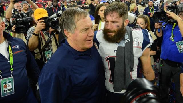 New England Patriots head coach Bill Belichick celebrates with wide receiver Julian Edelman (11) after defeating the Atlanta Falcons 34-28 in overtime during Super Bowl LI at NRG Stadium.