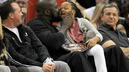 November 11, 2012; Los Angeles, CA, USA; NBA former player Shaquille O'Neal watches the game between the Los Angeles Clippers and the Atlanta Hawks with his daughter Me'arah, 6, at the Staples Center.