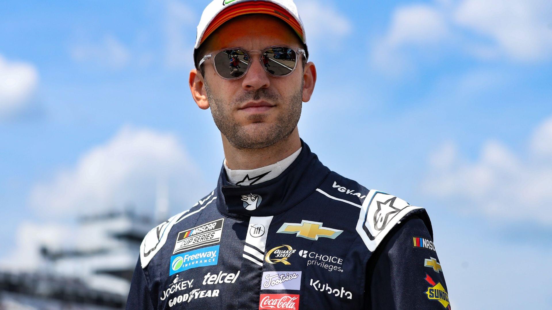 Jun 21, 2025; Long Pond, Pennsylvania, USA; NASCAR Cup Series driver Daniel Suarez walks on pit road during practice and qualifying for The Great American Getaway 400 at Pocono Raceway