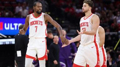 Houston Rockets forward Kevin Durant (7) reacts with center Alperen Sengun (28) after a play during the third quarter against the Utah Jazz at Toyota Center.