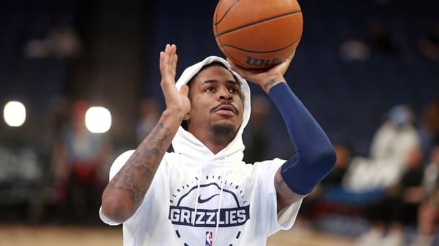 Nov 3, 2025; Memphis, Tennessee, USA; Memphis Grizzlies guard Ja Morant (12) shoots during warm ups prior to the game against the Detroit Pistons at FedExForum.