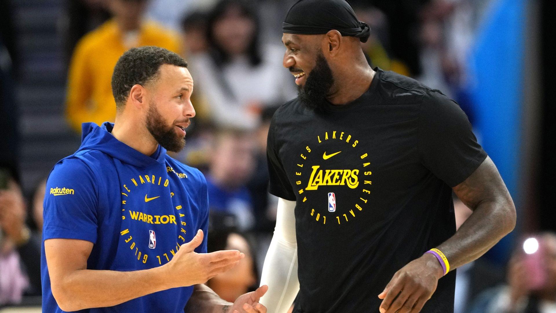 Dec 25, 2024; San Francisco, California, USA; Golden State Warriors guard Stephen Curry (left) and Los Angeles Lakers forward LeBron James (right) talk before the game at Chase Center