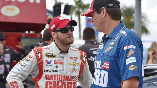 Jul 6, 2014; Daytona Beach, FL, USA; NASCAR Sprint Cup Series driver Dale Earnhardt Jr. And NASCAR crew chief Steve Letarte before the Coke Zero 400 at Daytona International Speedway.