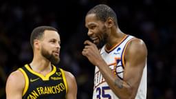 Golden State Warriors guard Stephen Curry (30) and Phoenix Suns forward Kevin Durant (35) talk during the second half at Chase Center.