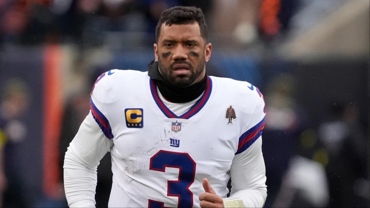 New York Giants quarterback Russell Wilson (3) leaves the field after losing to the Chicago Bears at Soldier Field.