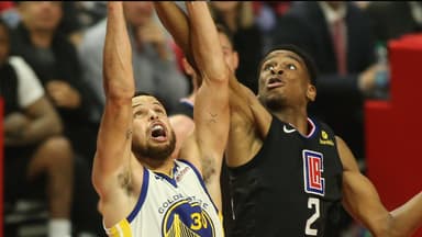 LA Clippers guard Shai Gilgeous-Alexander 2 goes for a rebound against Golden State Warriors guard Stephen Curry 30 during game 6 of the Golden State Warriors vs Los Angeles Clippers Playoffs series at Staples Center on April 26, 2019.