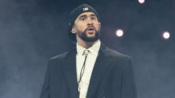 Bad Bunny looks towards the fans on stage during his “Most Wanted Tour” at Bridgestone Arena in Nashville, Tenn., Saturday, May 11, 2024.