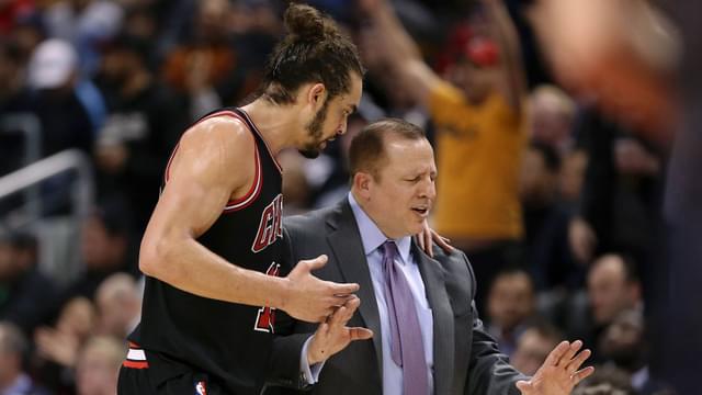 Feb 19, 2014; Toronto, Ontario, CAN; Chicago Bulls center Joakim Noah (13) talks to head coach Tom Thibodeau against the Toronto Raptors at Air Canada Centre. The Bulls beat the Raptors 94-92