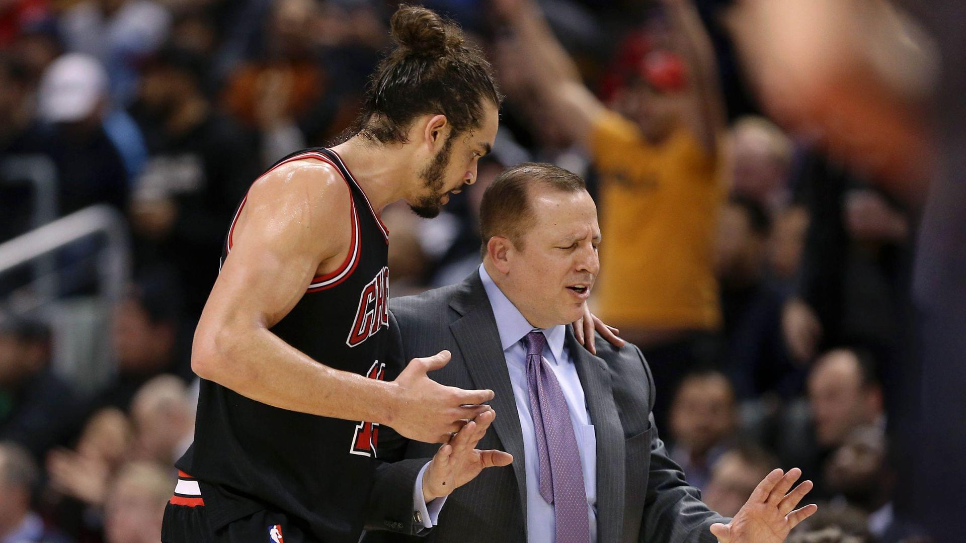 Feb 19, 2014; Toronto, Ontario, CAN; Chicago Bulls center Joakim Noah (13) talks to head coach Tom Thibodeau against the Toronto Raptors at Air Canada Centre. The Bulls beat the Raptors 94-92