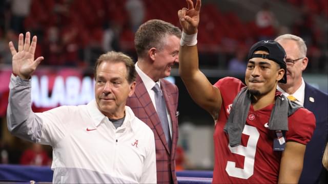 Alabama Crimson Tide head coach Nick Saban, left, and quarterback Bryce Young (9) celebrate their win against the Georgia Bulldogs during the SEC championship game at Mercedes-Benz Stadium. mouth guard