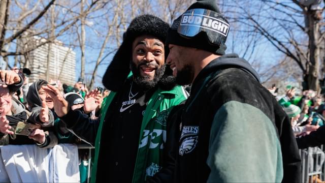 Philadelphia Eagles defensive end Brandon Graham (55) speaks to running back Saquon Barkley (26) during the Super Bowl LIX championship parade and rally.