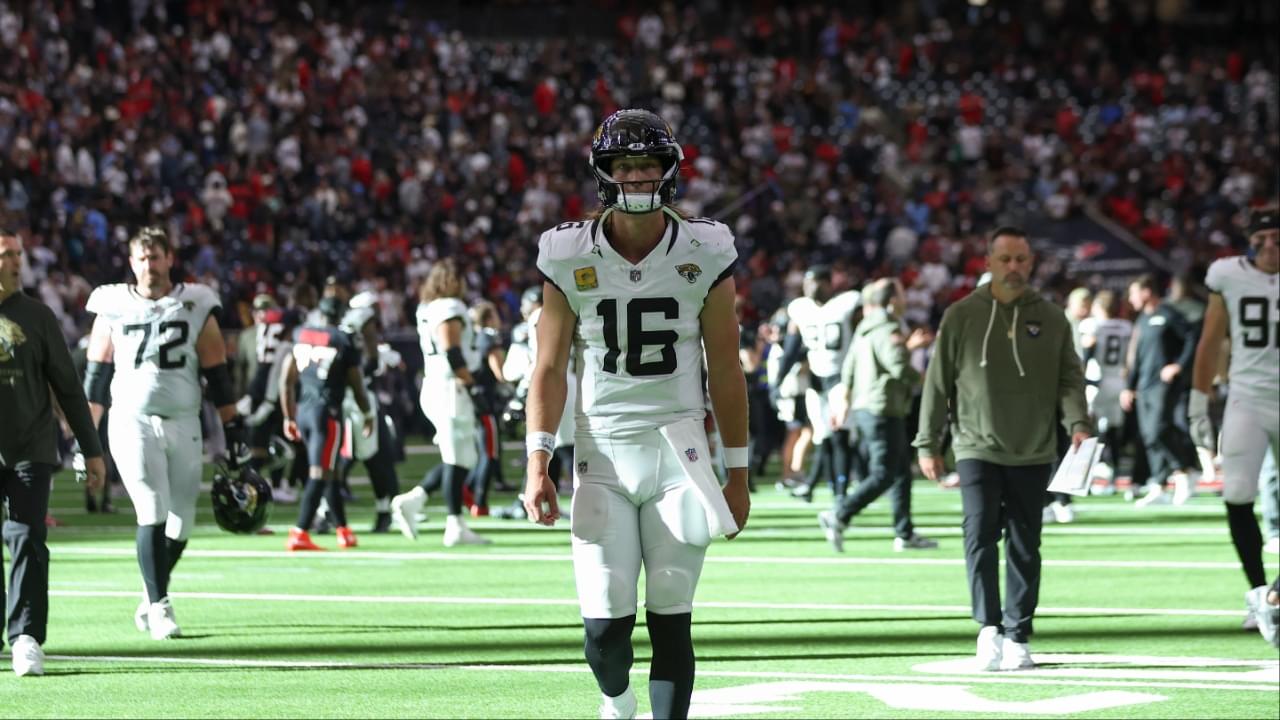Jacksonville Jaguars quarterback Trevor Lawrence (16) walks off the field after the game against the Houston Texans at NRG Stadium.