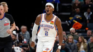 Nov 9, 2025; Memphis, Tennessee, USA; Oklahoma City Thunder guard Shai Gilgeous-Alexander (2) reacts after a three point basket during the fourth quarter against the Memphis Grizzlies at FedExForum.