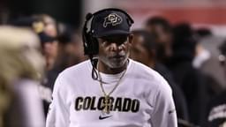 Colorado Buffaloes head coach Deion Sanders looks on during a time out in the game against the Utah Utes during the second quarter at Rice-Eccles Stadium.