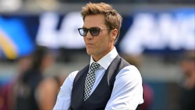 Tom Brady looks on before the game between the Los Angeles Chargers and the Washington Commanders at SoFi Stadium.