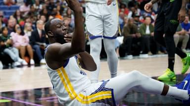 Golden State Warriors forward Draymond Green (23) asks for a review after colliding with New Orleans Pelicans forward Trey Murphy III (25) during the first half at Smoothie King Center