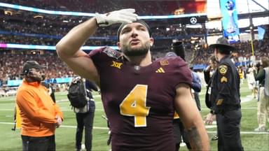 Arizona State running back Cam Skattebo (4) blows a kiss toward fans after Texas won 39-31 in double overtime in the Chick-fil-A Peach Bowl in Atlanta on Jan. 1, 2025.
