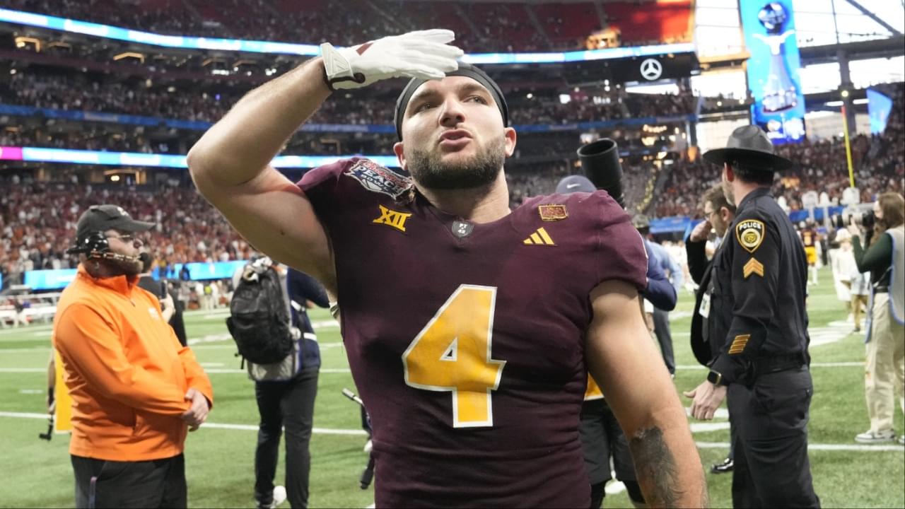 Arizona State running back Cam Skattebo (4) blows a kiss toward fans after Texas won 39-31 in double overtime in the Chick-fil-A Peach Bowl in Atlanta on Jan. 1, 2025.