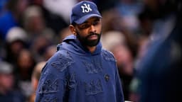 Dallas Mavericks guard Kyrie Irving (11) looks on during the second half against the Memphis Grizzlies at the American Airlines Center.