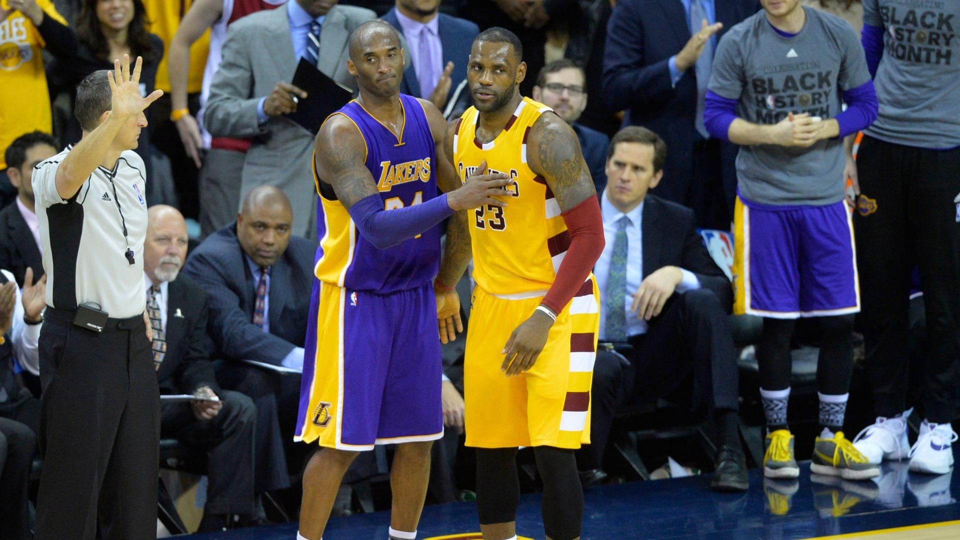 Feb 10, 2016; Cleveland, OH, USA; Cleveland Cavaliers forward LeBron James (23) talks with Los Angeles Lakers forward Kobe Bryant (24) near the end of the Cavaliers' 120-111 win at Quicken Loans Arena.