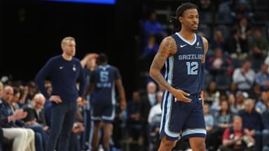 Nov 3, 2025; Memphis, Tennessee, USA; Memphis Grizzlies guard Ja Morant (12) checks into the game during the second quarter against the Detroit Pistons at FedExForum